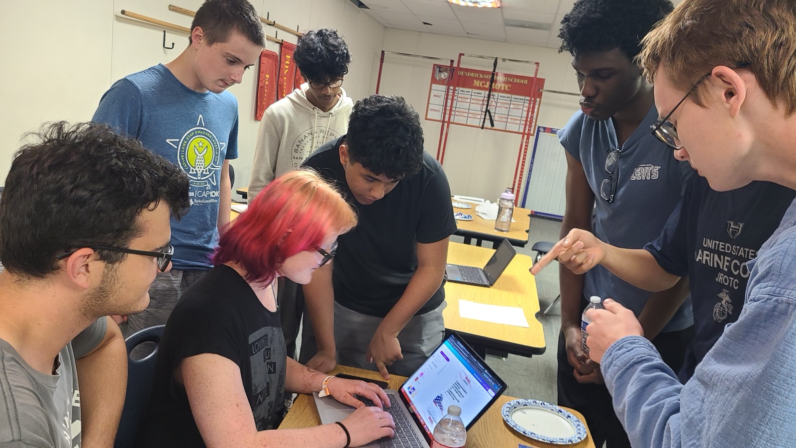 Cadets working together on the Fundraising Leadership Team